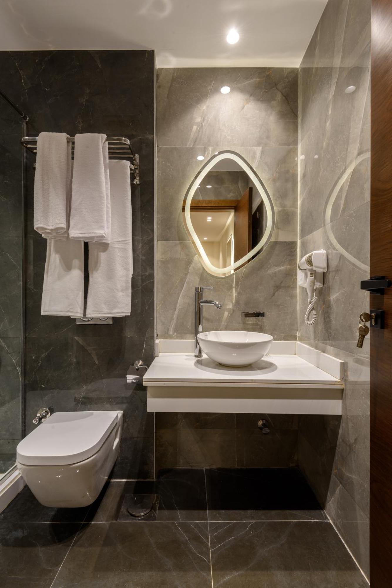 Spire West Hotel Al Kawm al Akhdar ภายนอก รูปภาพ