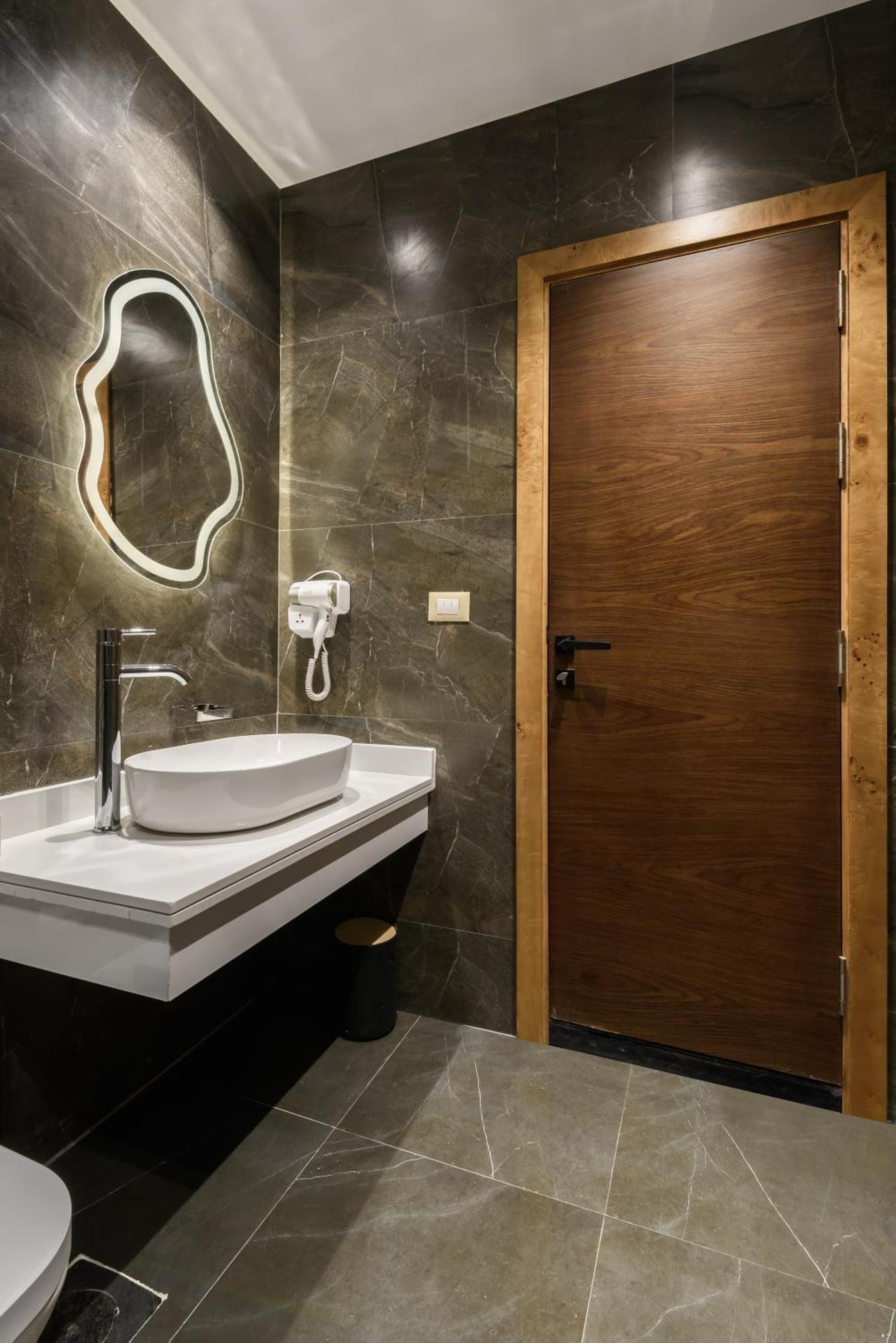Spire West Hotel Al Kawm al Akhdar ภายนอก รูปภาพ